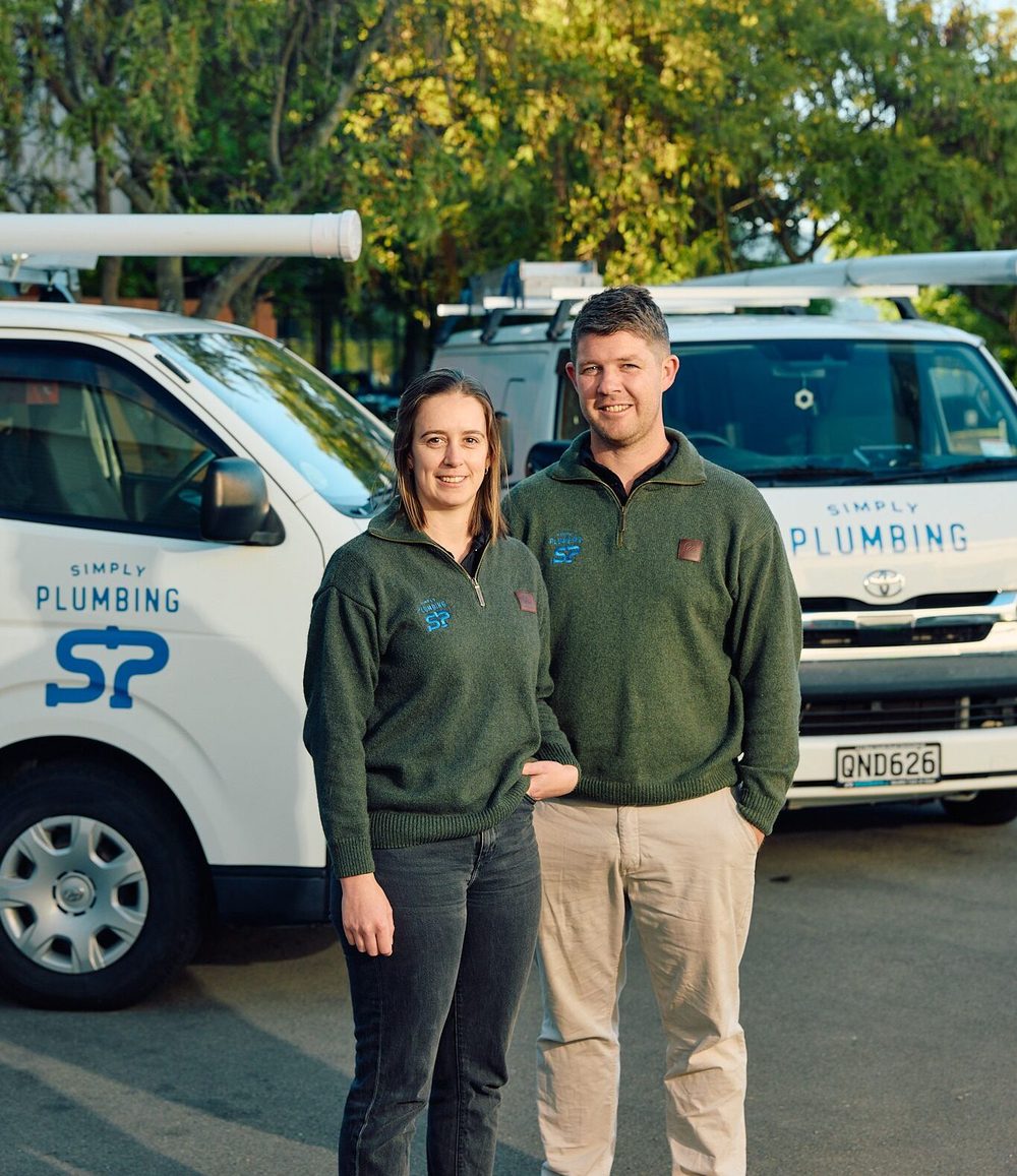 The Simply Plumbing team with their vans